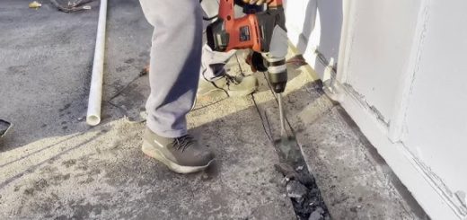 man using hammer drill